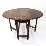 An oak oval barley twist gateleg table, W89cm, H73cm, D43cm