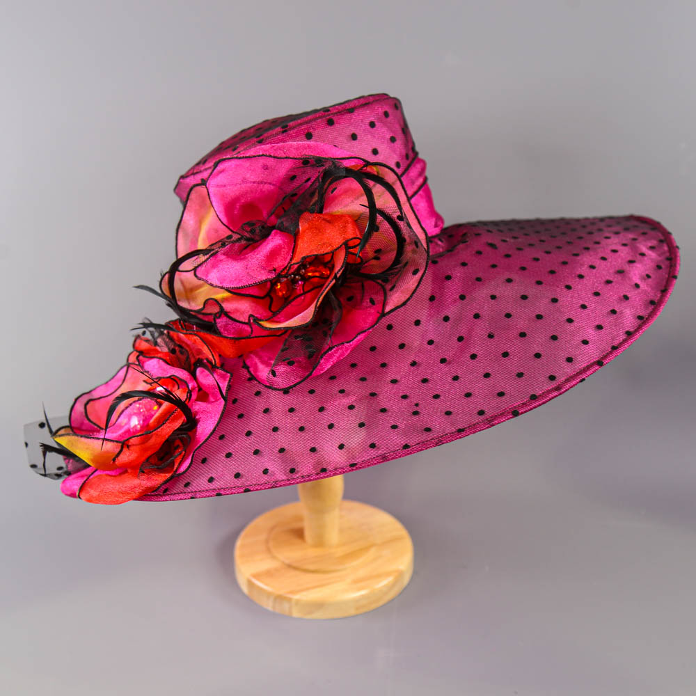 SUZANNE BETTLEY - Fuchsia pink with black polka dot occasion hat, with flower and gemstone and