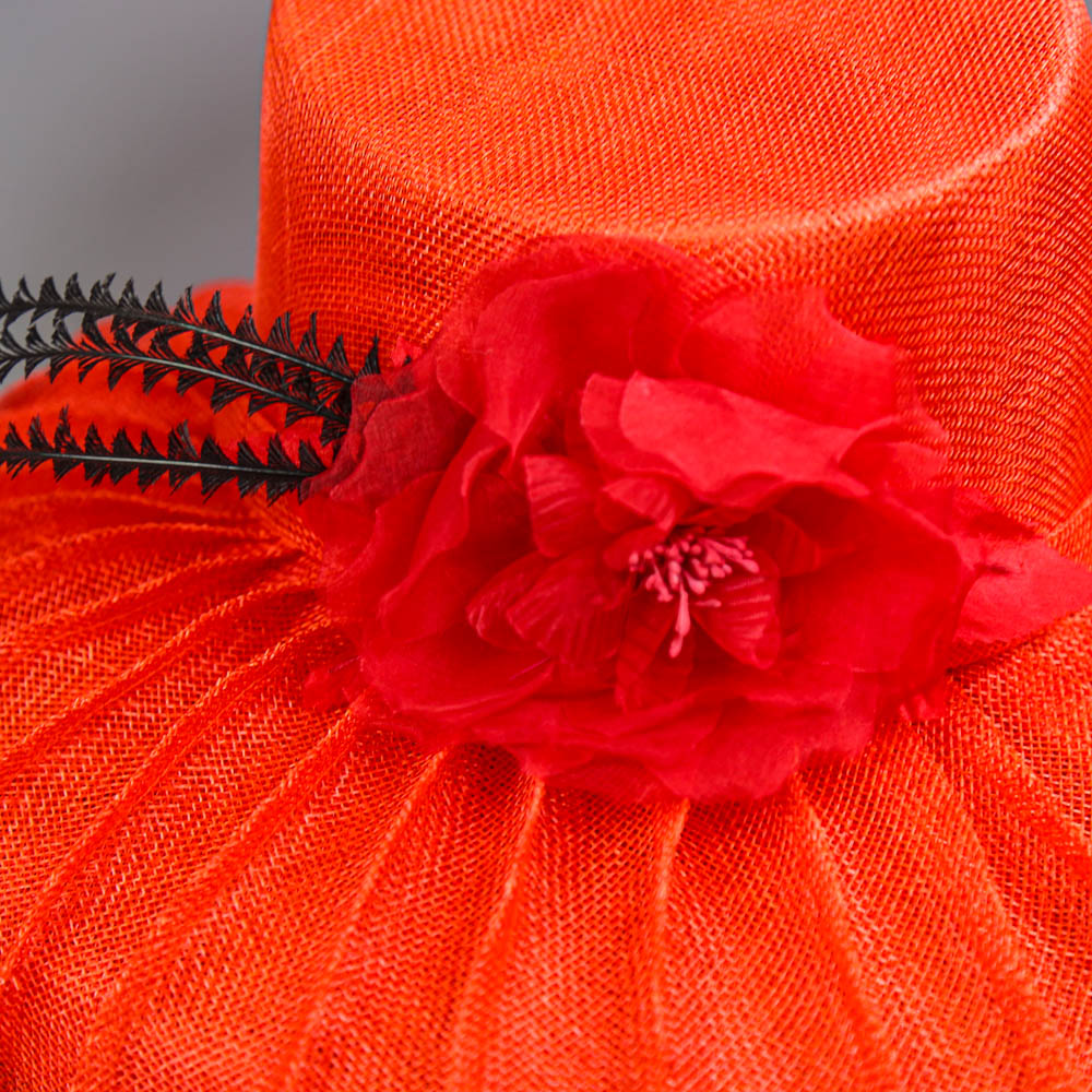 PETER BETTLEY LONDON - Coral red occasion hat, with flower and black feather detail, angled crown, - Image 4 of 7