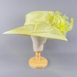 PETER BETLEY LONDON - Lime green occasion hat, with bow feather and twirl detail, internal