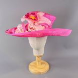 VICTORIA ANN - Fuchsia pink occasion hat, with lily and rose flower and twirl detail, internal