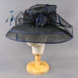 PETER BETTLEY LONDON - Black and navy blue occasion hat, with feather and bow detail, internal