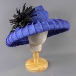 PETER BETTLEY LONDON - Royal blue occasion hat, with black feather flower detail, new with tags (