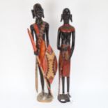 A pair of carved and painted wood Maasai figures, tallest 60cm