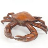 An Oriental carved and polished hardwood crab box, overall leg span 29cm