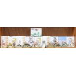 A shelf of 10 Lilliput Lane cottages, church etc, boxed