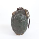 A First World War Period Mills bomb inert hand grenade with pin and firing lever, no. 5 mark I