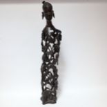 A large African hardwood carving of figures from a single piece of wood, height 75cm