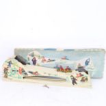 A Russian tinplate clockwork toy toboggan run, with 2 figures