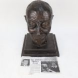 A black painted plaster bust of Councillor A G V Page, Chairman of Coulsdon and Purley Council, by B