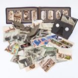 A stereo viewer and various Army Club cigarette card slides, a pair of metal mounts, height 16cm,