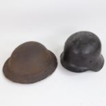 A Second World War Period British Army Brodie steel helmet, and a German Army Stahlhelm helmet (2)