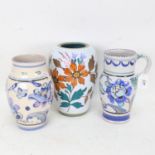 A Gouda Pottery vase, with painted floral decoration, 23cm, and 2 Honiton Pottery hand painted vases