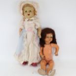 2 Vintage composition head dolls, 1 with original clothes, height 59cm, and another with jointed