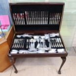 A canteen of King's pattern Sheffield plate cutlery for 12 people, in fitted mahogany cabinet