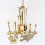 A brass companion set on stand, height 52cm, 3 pairs of brass candlesticks etc