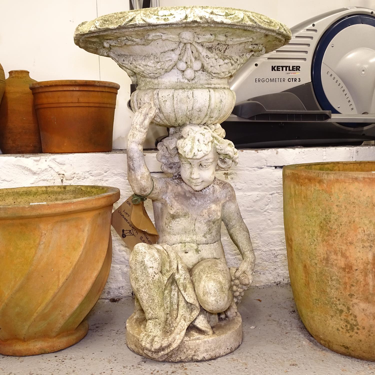 A weathered vintage Italian cherub putti urn planter,