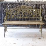 A small scrolled cast-iron garden bench, L120cm