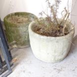 2 weathered circular garden plant pots
