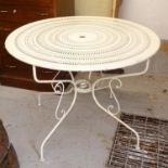 A white painted wrought-iron circular garden table, W97cm, H72cm