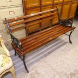 A painted wrought-iron and teak slatted garden bench, L122cm