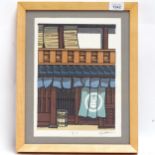 Japanese coloured woodblock print, shop front, indistinctly signed, 27cm x 20cm, framed