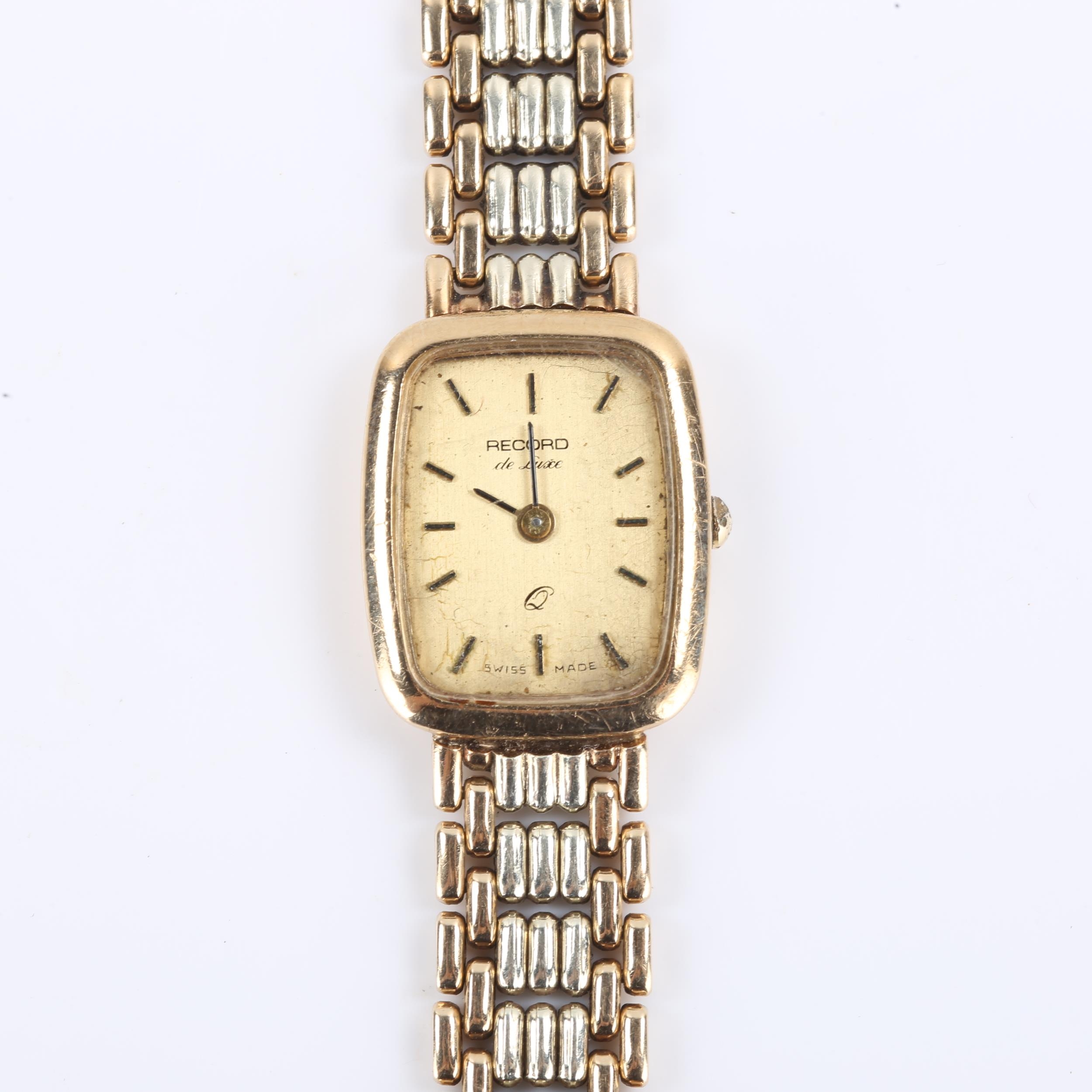 RECORD - a lady's Vintage 9ct gold De Luxe quartz bracelet watch, champagne dial with gilt baton