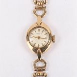 RODANIA - a lady's Vintage 9ct gold mechanical bracelet watch, silvered dial with baton hour markers