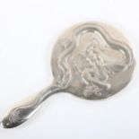 An early/mid 20th century Chinese export silver dressing table hand mirror, by Wang Hing, relief