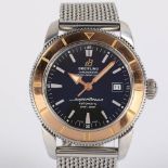 BREITLING - an 18ct rose gold and stainless steel SuperOcean Heritage chronometer automatic bracelet