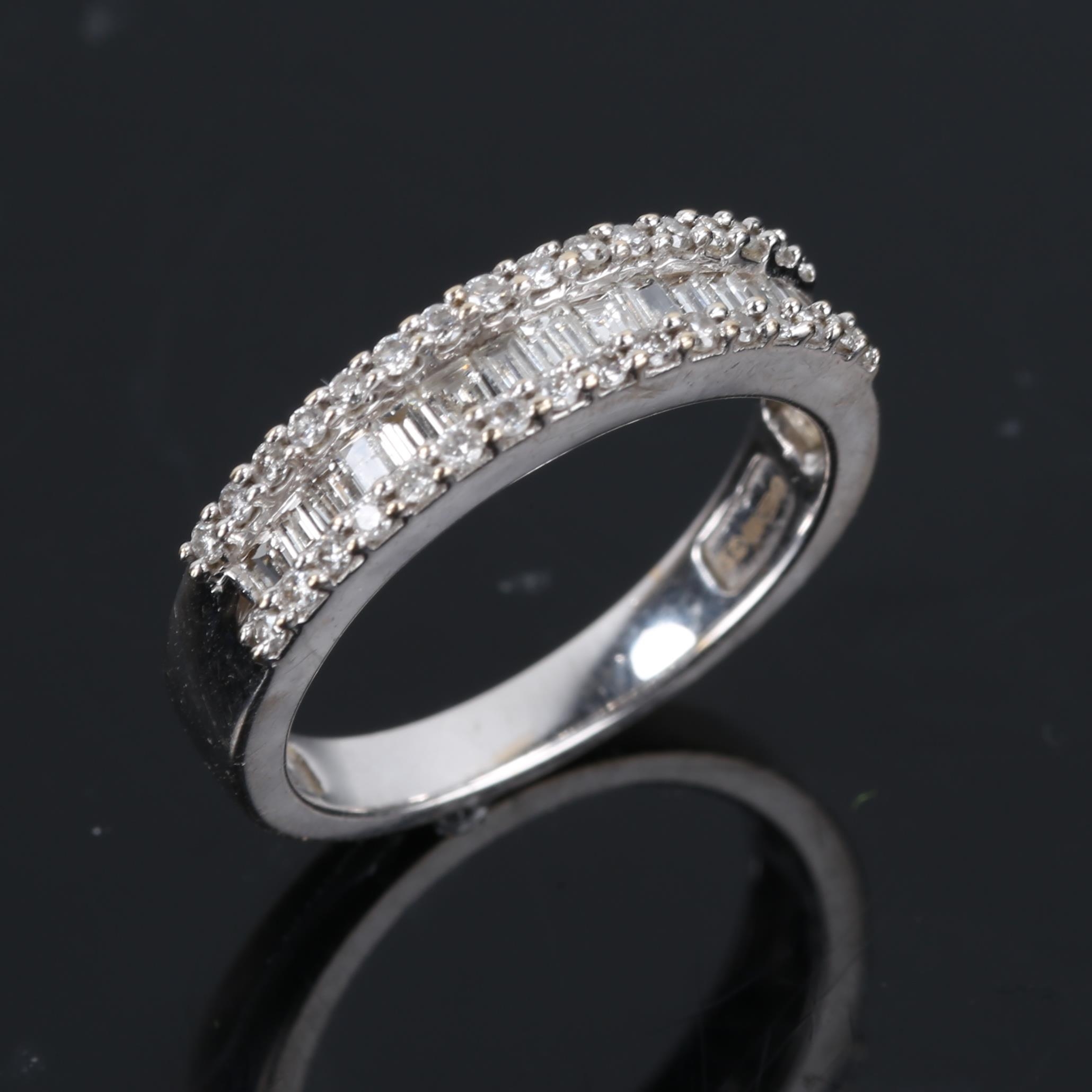 A modern 18ct white gold diamond cluster half hoop band ring, set with baguette and round - Image 2 of 5