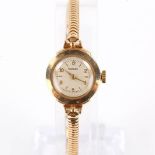 ROTARY - a lady's Vintage 9ct gold mechanical bracelet watch, silvered dial with gilt eighthly