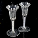 2 similar 18th century cordial glasses, with milk twist stems, height 16.5cm