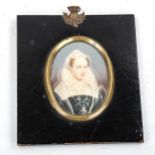 A miniature watercolour on ivory, portrait of an Elizabethan lady, brass-mounted lacquer frame,