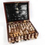 A 19th century mahogany homeopathic medicine chest, containing original glass jars by Mawson of