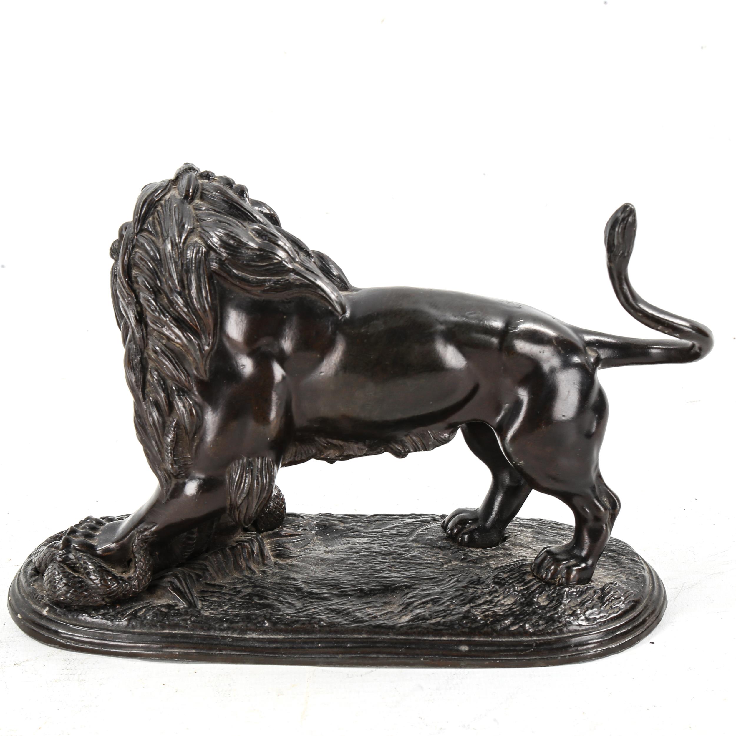 Victorian bronze patinated spelter sculpture, lion with a snake, length 21cm - Image 2 of 3