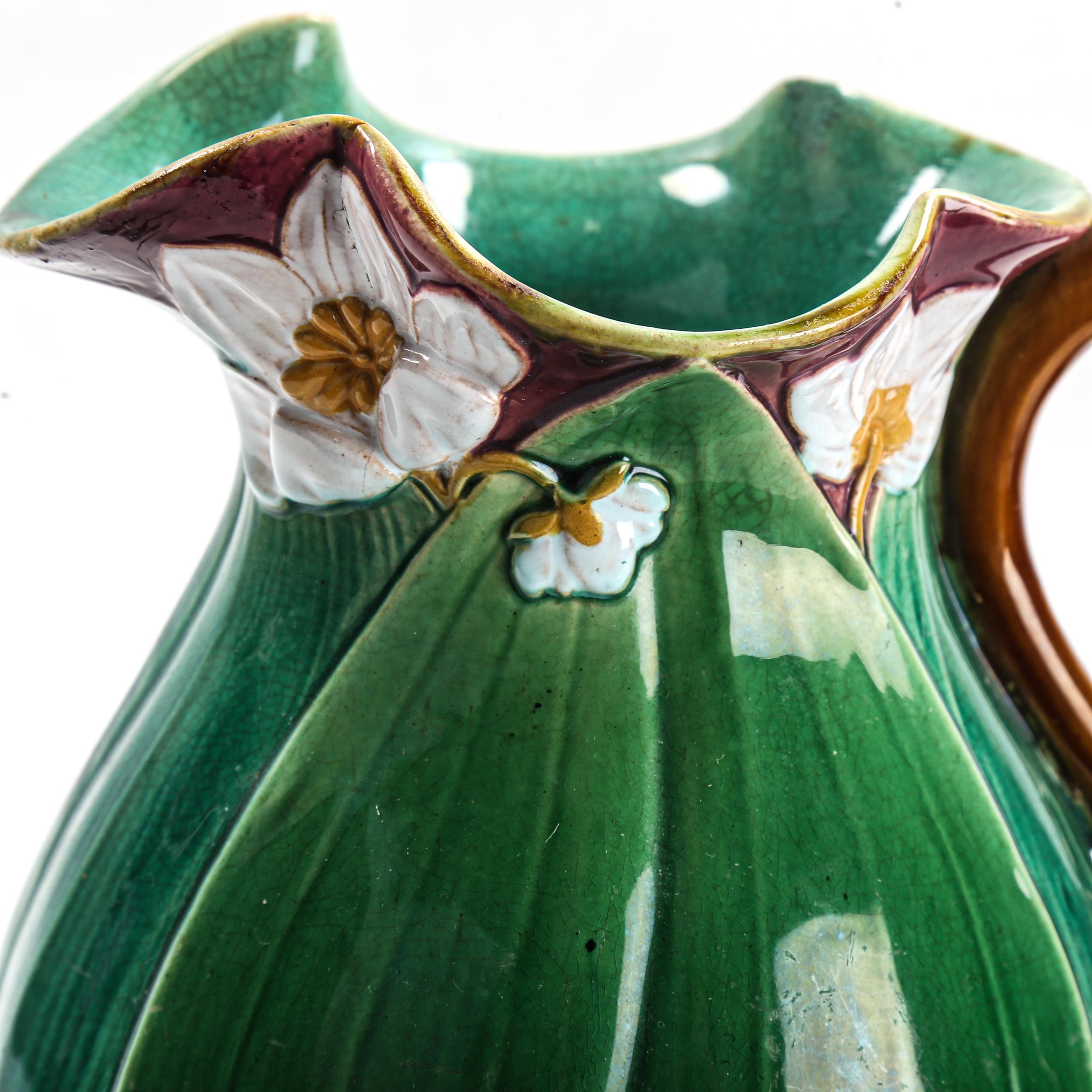 Minton Majolica pottery jug, lily flower and leaf moulded body, serial no. 1228, height 22cm - Image 2 of 3