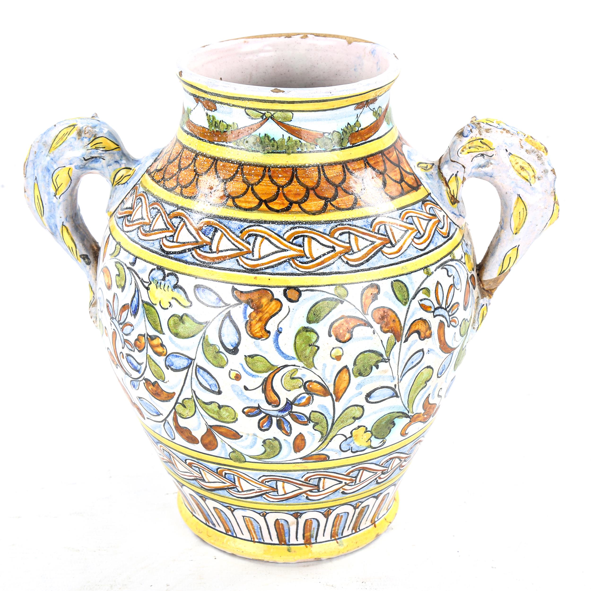 An Italian tin-glazed pottery wine vessel, with painted decoration and spout, height 22cm - Image 2 of 3