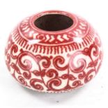 A Delft Pottery vase, with hand painted iron red design, signed with monogram, diameter 12cm