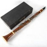 BUTHOD & THIBOUVILLE - an early 19th century boxwood ebony and ivory clarinet, length 66cm Ivory