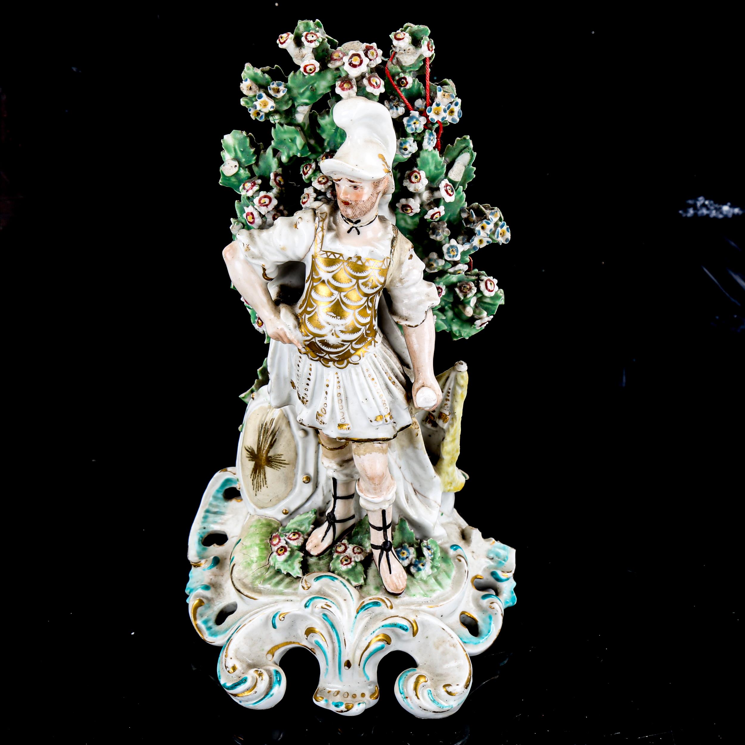 An 18th century Chelsea porcelain Greek warrior bocage figure, height 19cm (A/F)