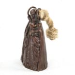 A patinated bronze hand bell, in the form of an Elizabethan woman, height 20cm