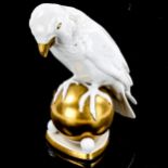 Hutschenreuther gilded white glaze porcelain parrot, height 20cm