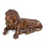 FRANZ BERGMAN - patinated bronze sculpture, reclining lion, serial no. 6045, length 20cm