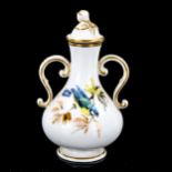 A small German porcelain 2-handled flask and cover, with hand painted garden birds, crossed swords