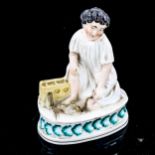 Staffordshire china figure, child with rats, height 14cm