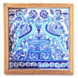 A Persian blue and turquoise painted pottery tile, with bird decoration, framed, 34cm x 34cm