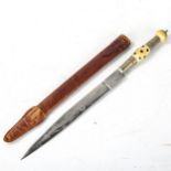 A Vintage Gaucho knife, blade engraved Venenoza, composition handle with leather scabbard, length