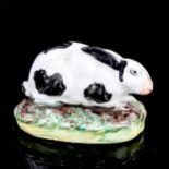 An early 19th century Staffordshire Pottery rabbit, length 8cm