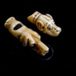 2 Antique carved bone dog's head design whistles, 18th or 19th century, length 5.5cm and 4cm